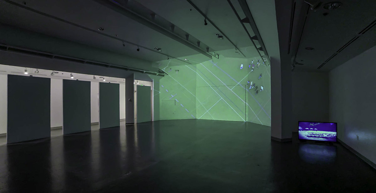 Installation of video, sculpture, and projection artwork by Dan Paz installed at Vachon Gallery
