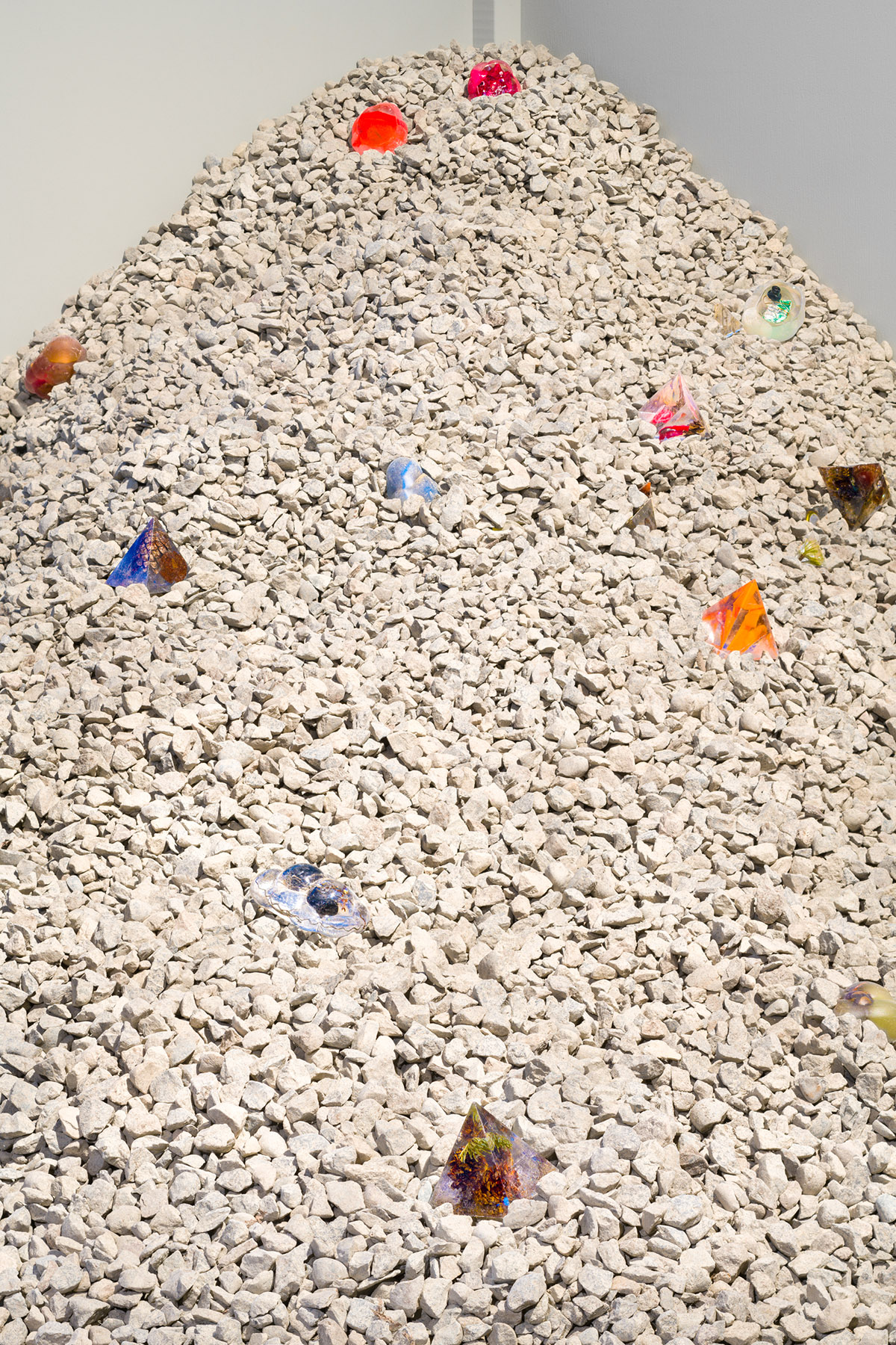 Detail image of participatory artwork, featuring gravel and resin works by E.T. Russian installed at Hedreen Gallery 