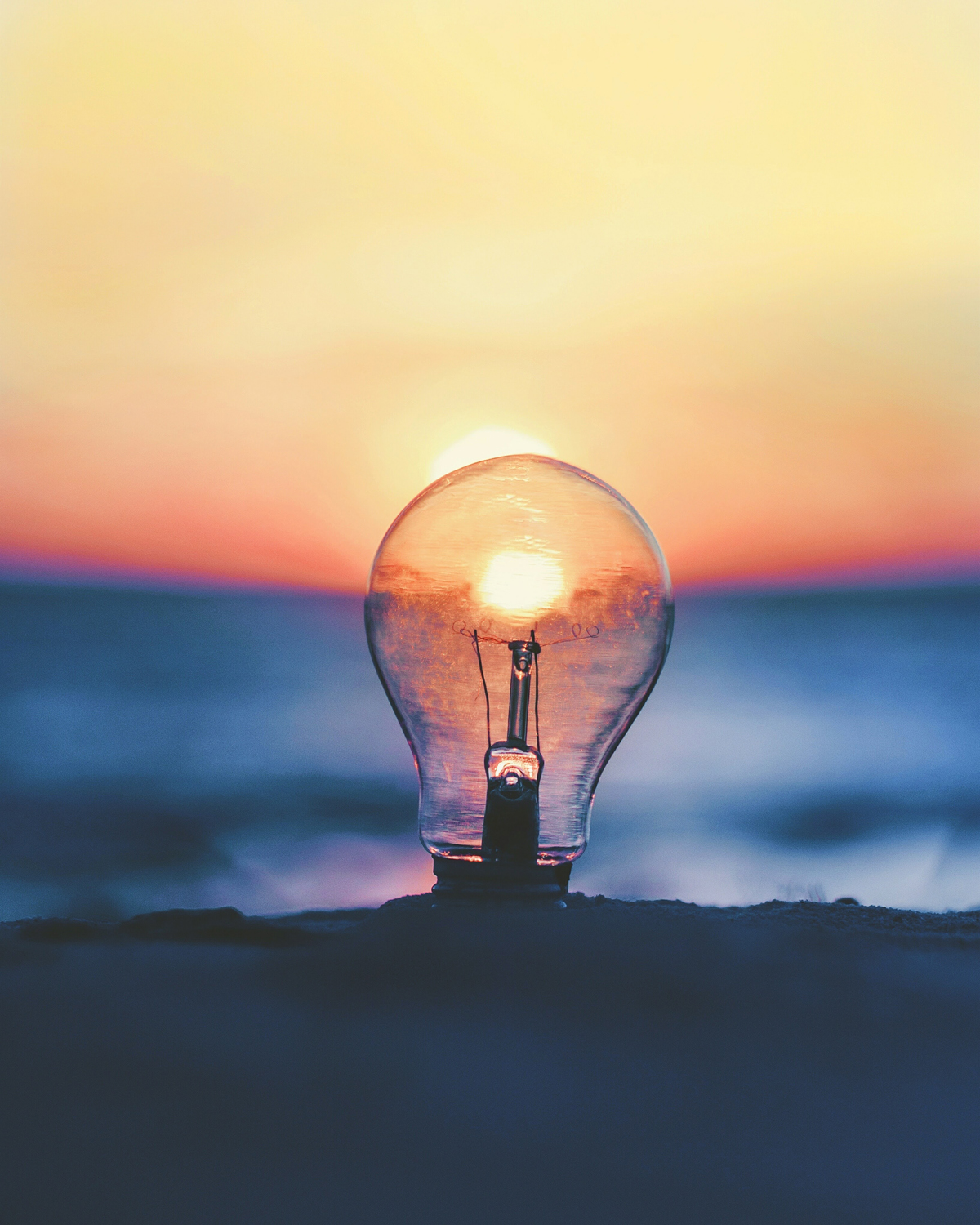 Lightbulb with Sunset, taken by Ameen Fahmy