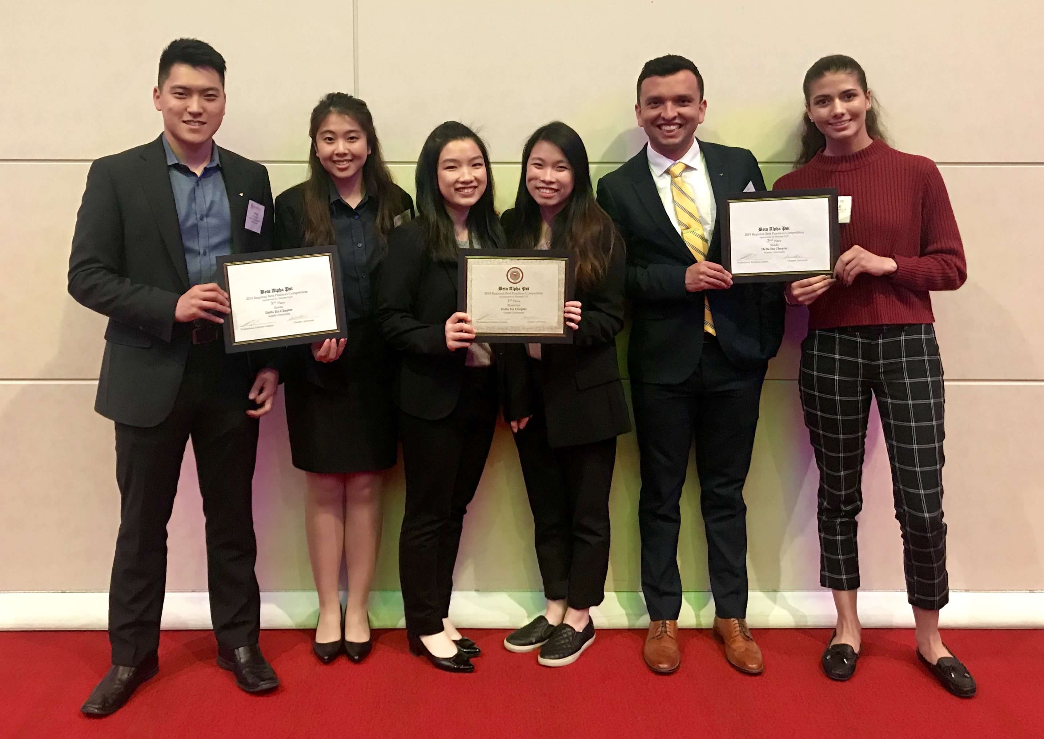 Six SU BAP NW Region Winners Holding Award Certificates