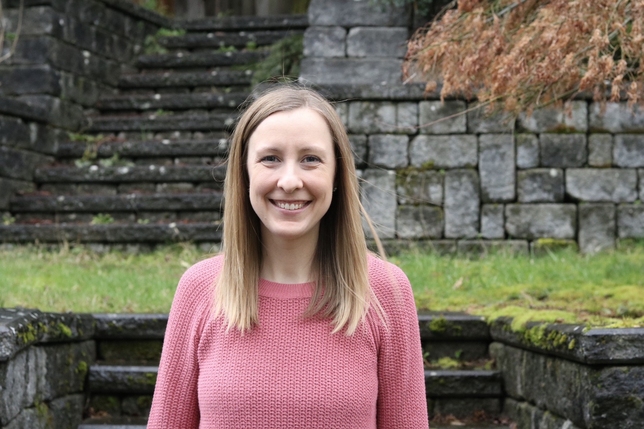 Image of Megan Cycyota standing outside in a garden