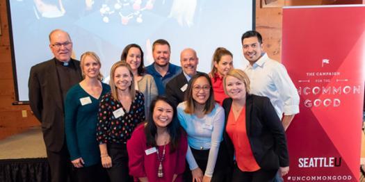 A group photo of alumni and staff at the Uncommon Impact Portland event