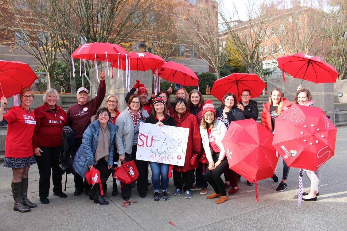 Alumni Group Photos with Red Umbrellas