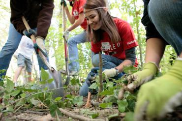 Seattle University student gardening for Day of Service