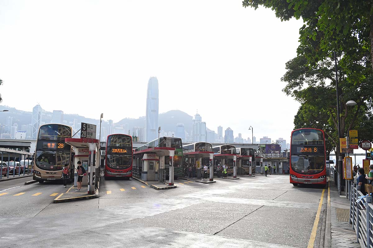 photograph of a busses at a fuling station