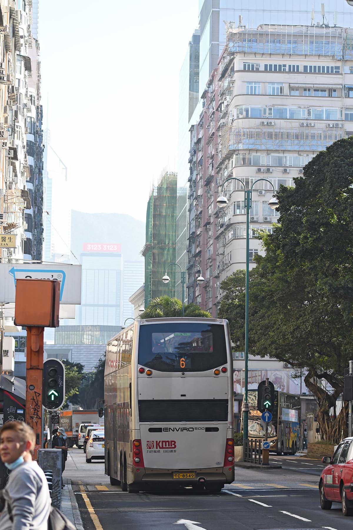 photograph of a bus in a city