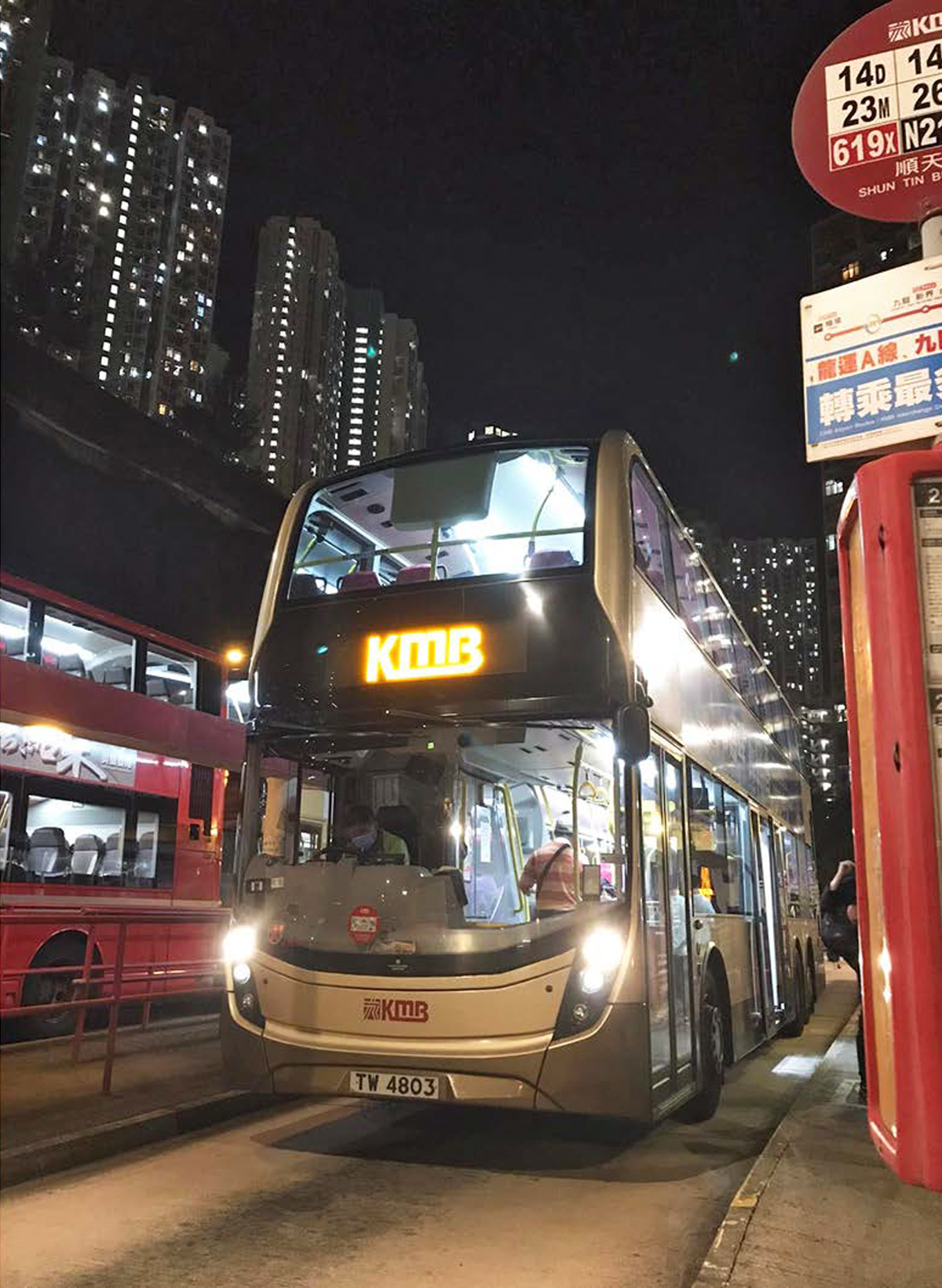 Photograph of double-decker bus on street in Hong Kong