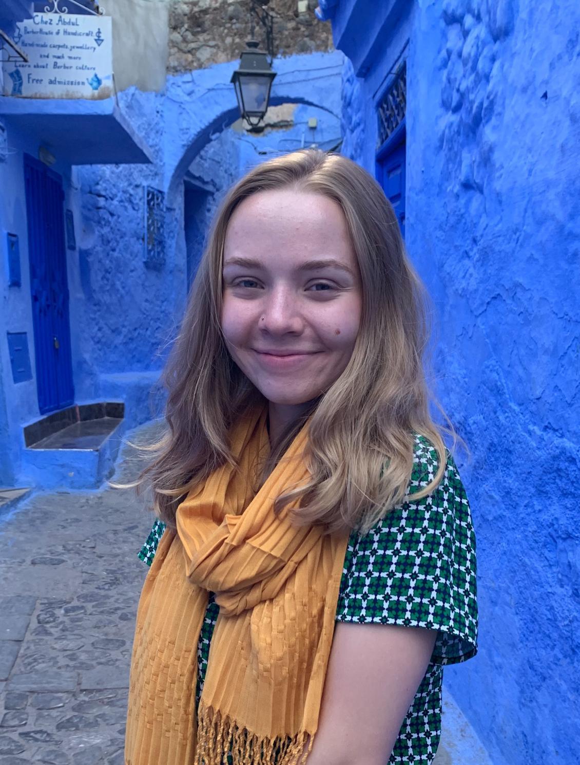Audrey Akots in Chefchaouen among blue buildings