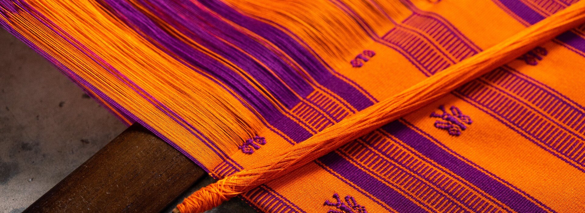 Orange and Purple woven fabric