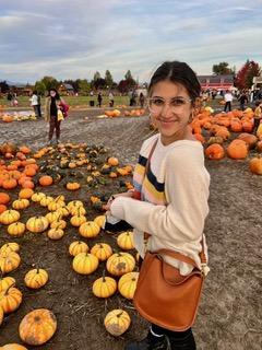 Student photo in a pumpkin patch