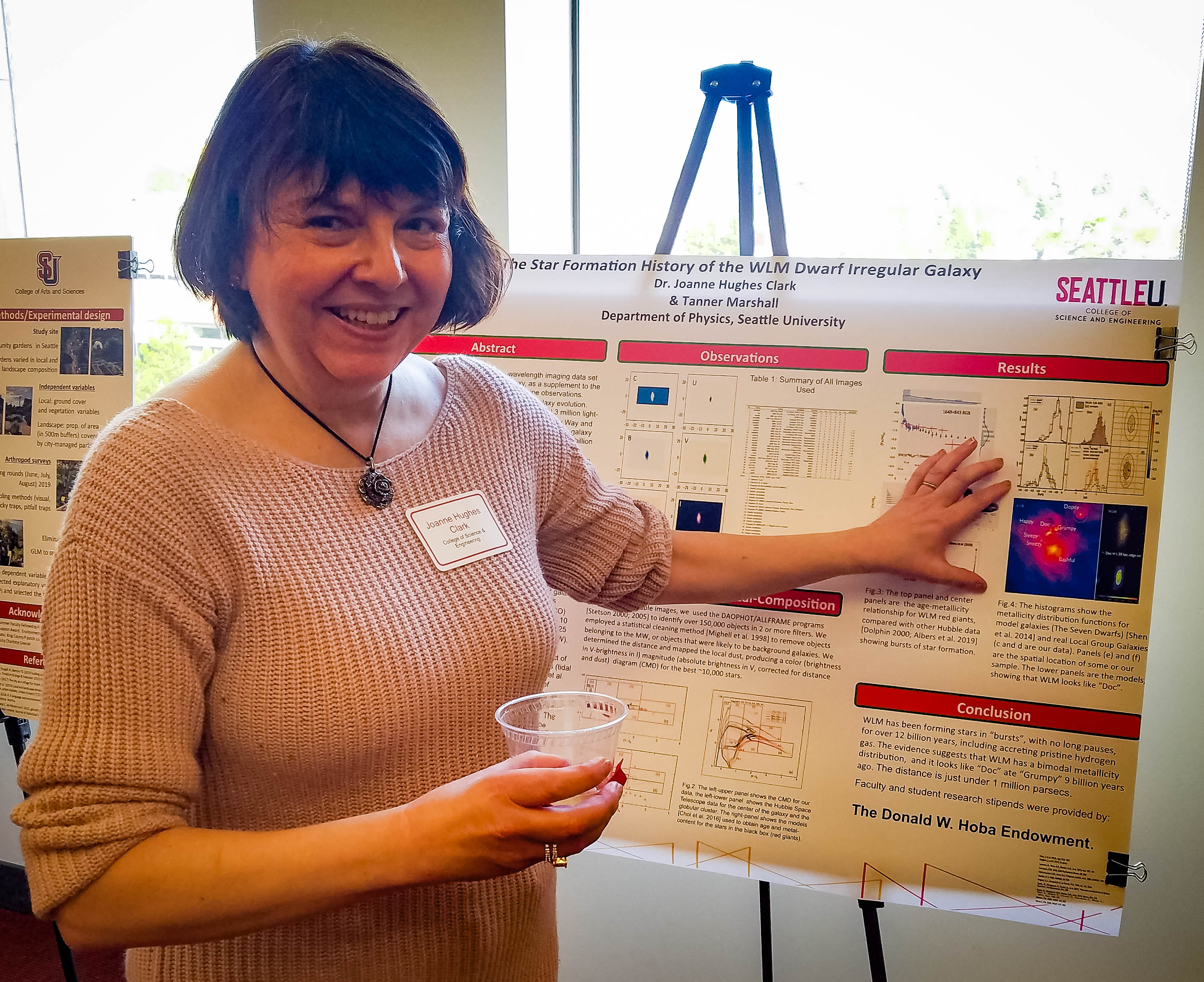 Joanne Hughes at the Fall Faculty Research event sharing her poster.