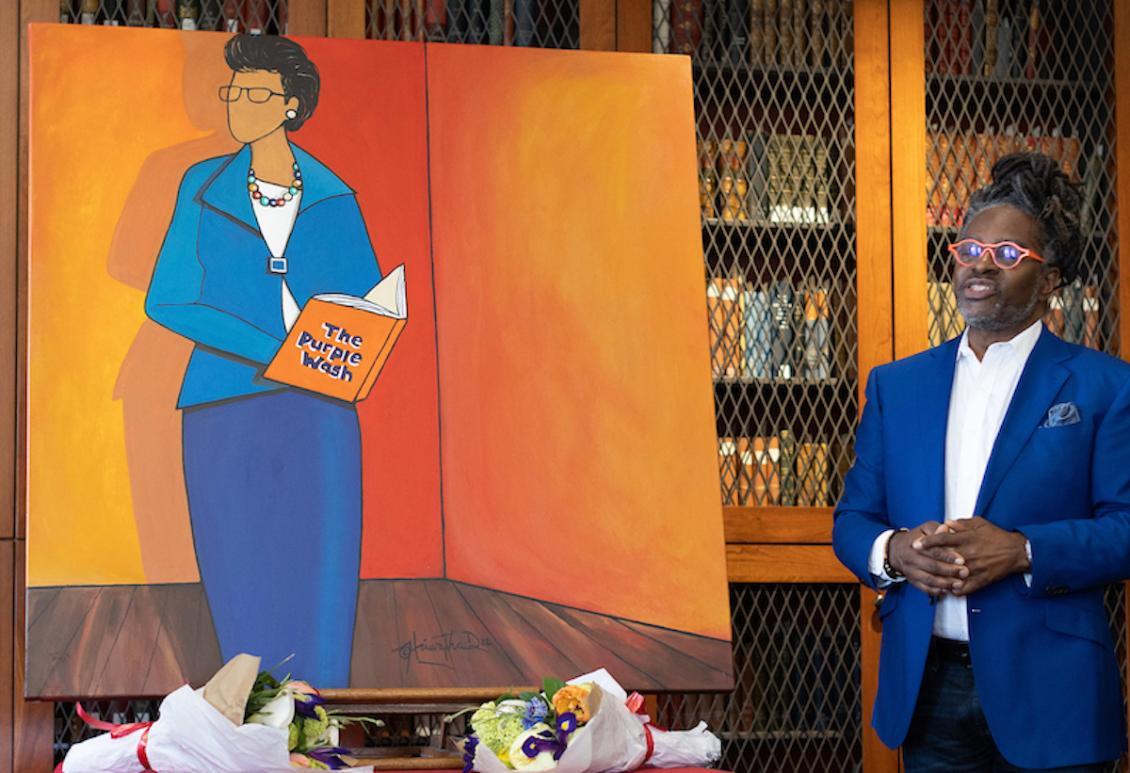Picture of painting of Minnie Collins with artist Hiawatha D.