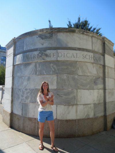 Alaina Bever posing in front of Harvard Medical School