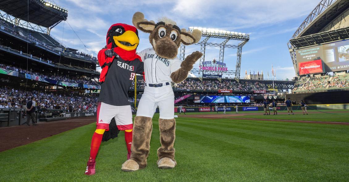 Rudy the Redhawk posing with Mariners Moose at T Mobile Park