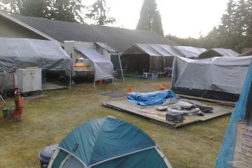 teal and gray tents at Tent City 4 in Sammamish