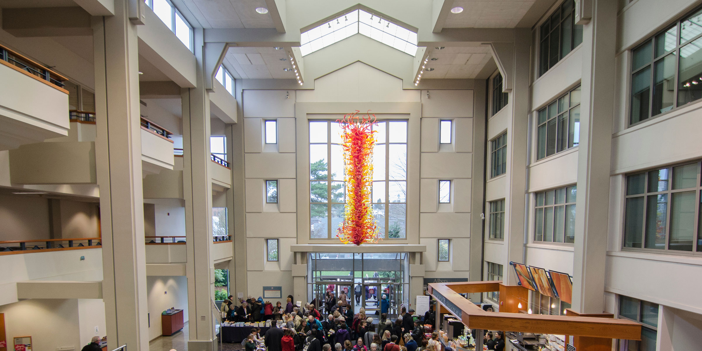 Pigott building atrium filled with event attendees