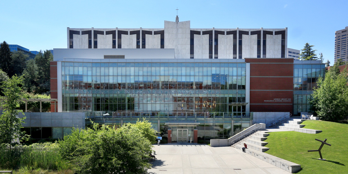 front exterior of Lemieux Library on a sunny afternoon
