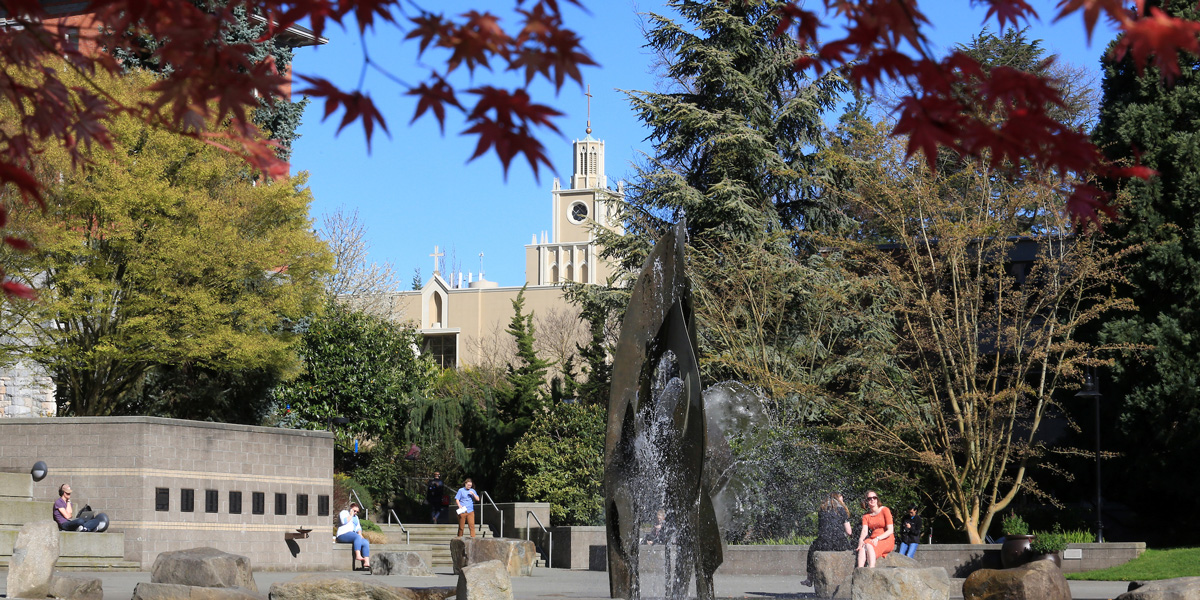 students at the quad and fountain in the spring