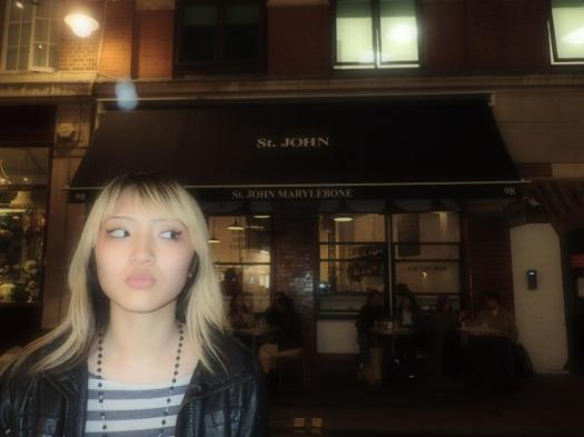 woman standing in front of a building