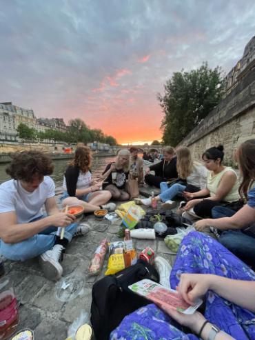 A group of people having a picnic.