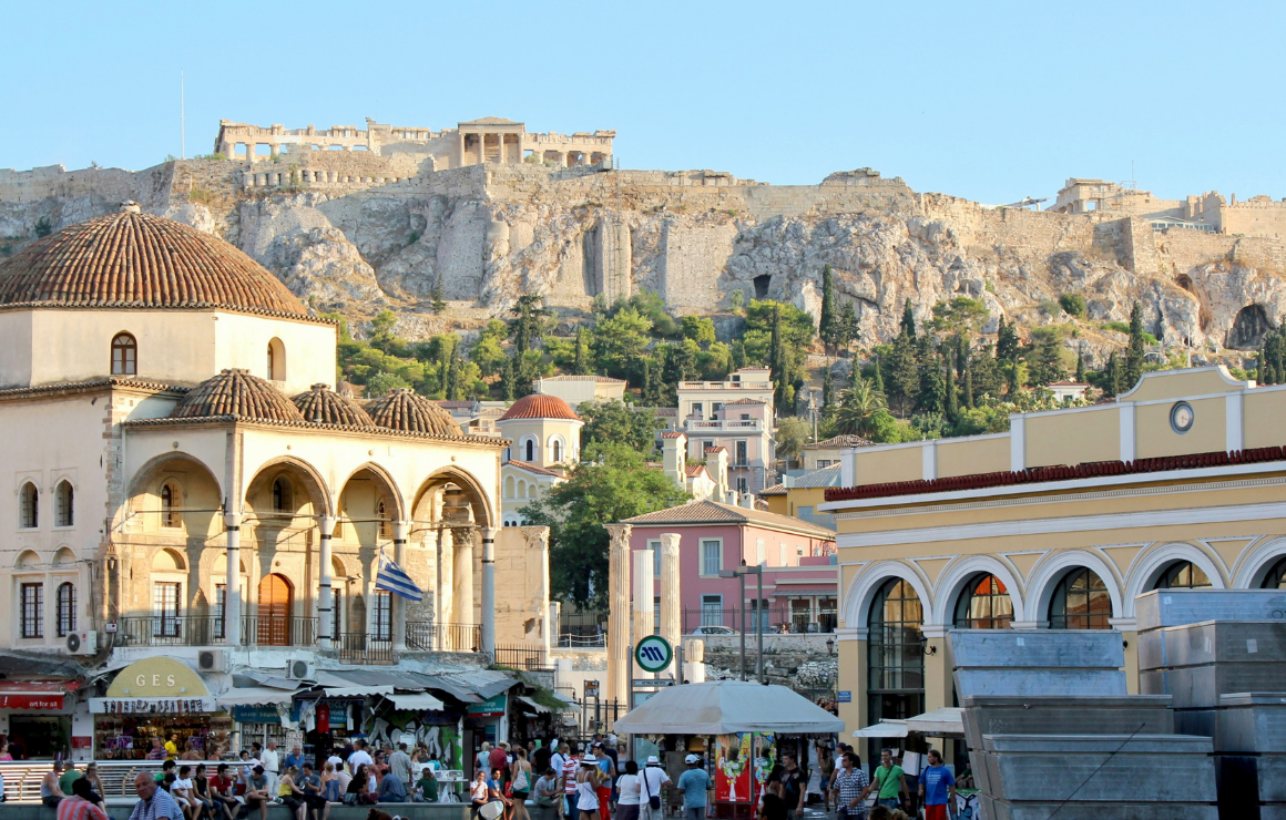 Greek town square with the Acropolis in the background on a hill