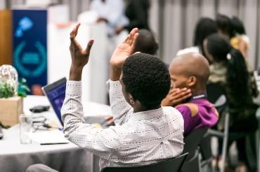 Participants engaging in a business conference