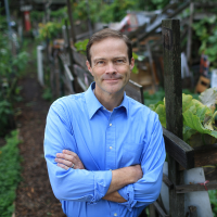 Rob Efird smiling with arms crossed