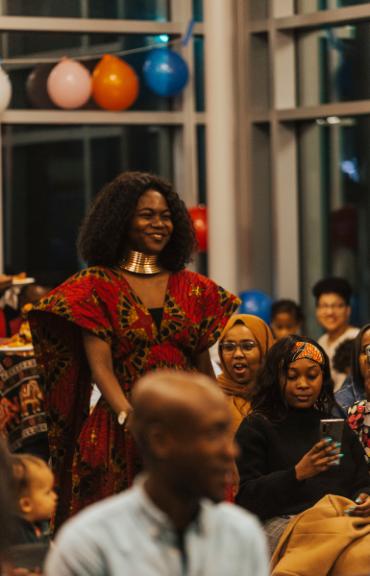 Student modeling at event with people surrounding