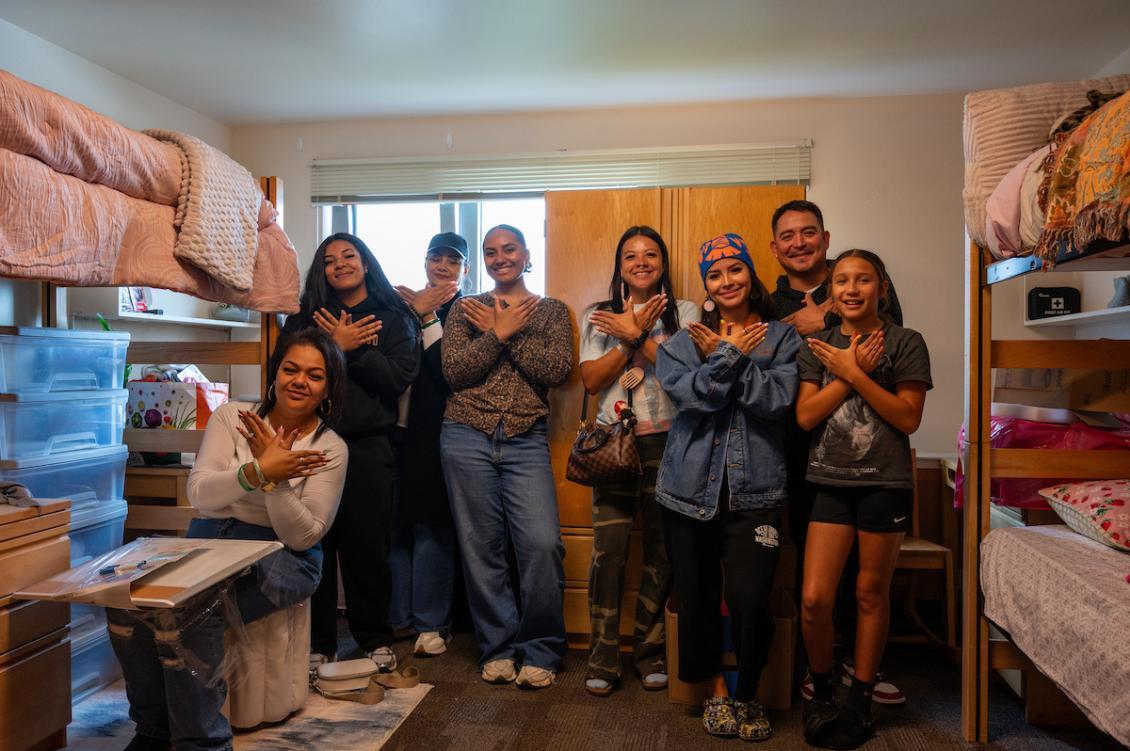 Fall move in day big family in dorm.jpeg