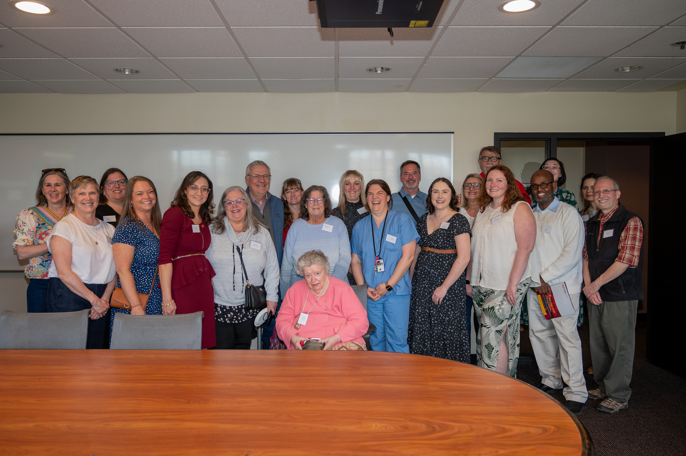 A photo of a group celebrating the Diagnostic Ultrasound 50th Anniversary