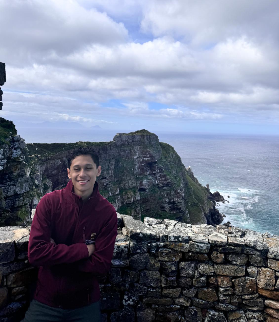 Alonso with sea behind him