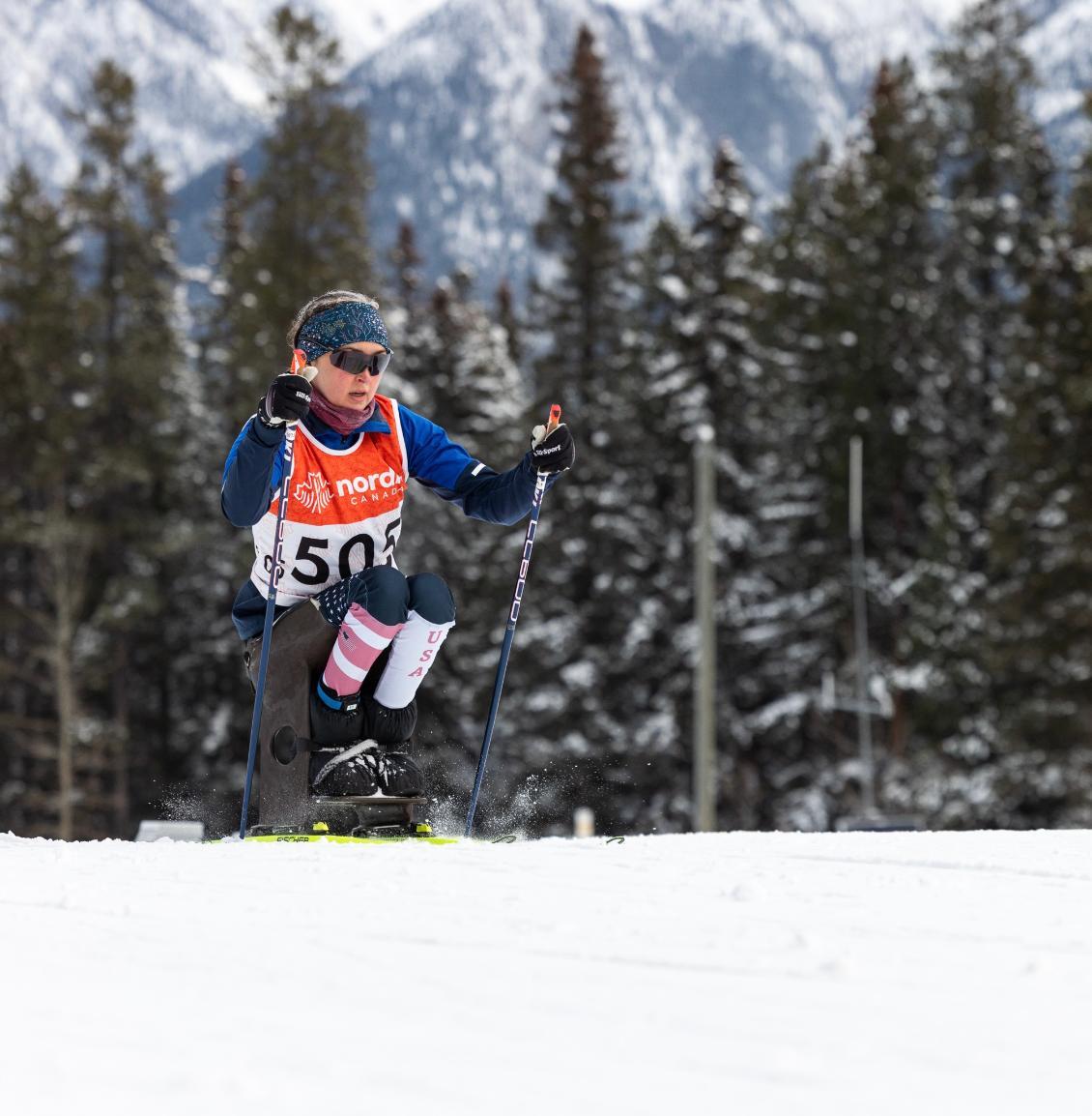 Erin Martin paralympics skis with trees