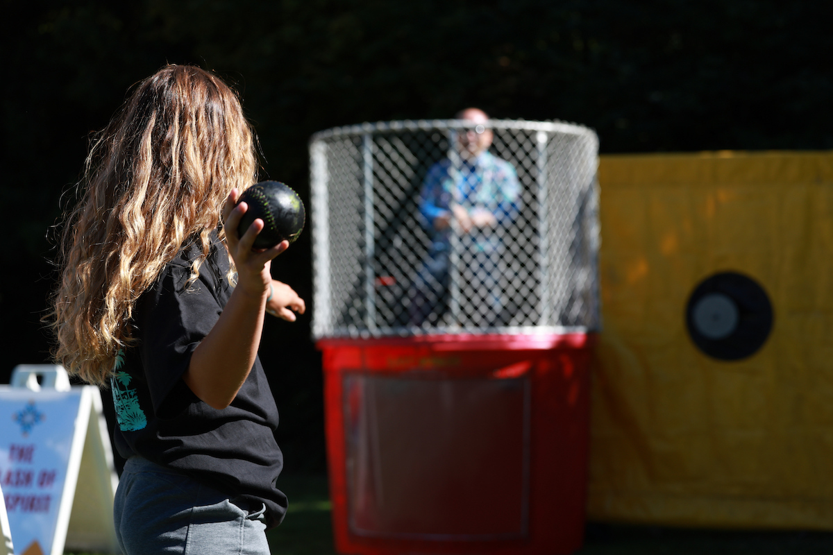 Feast Fest girl throwing at dunk tank.jpeg