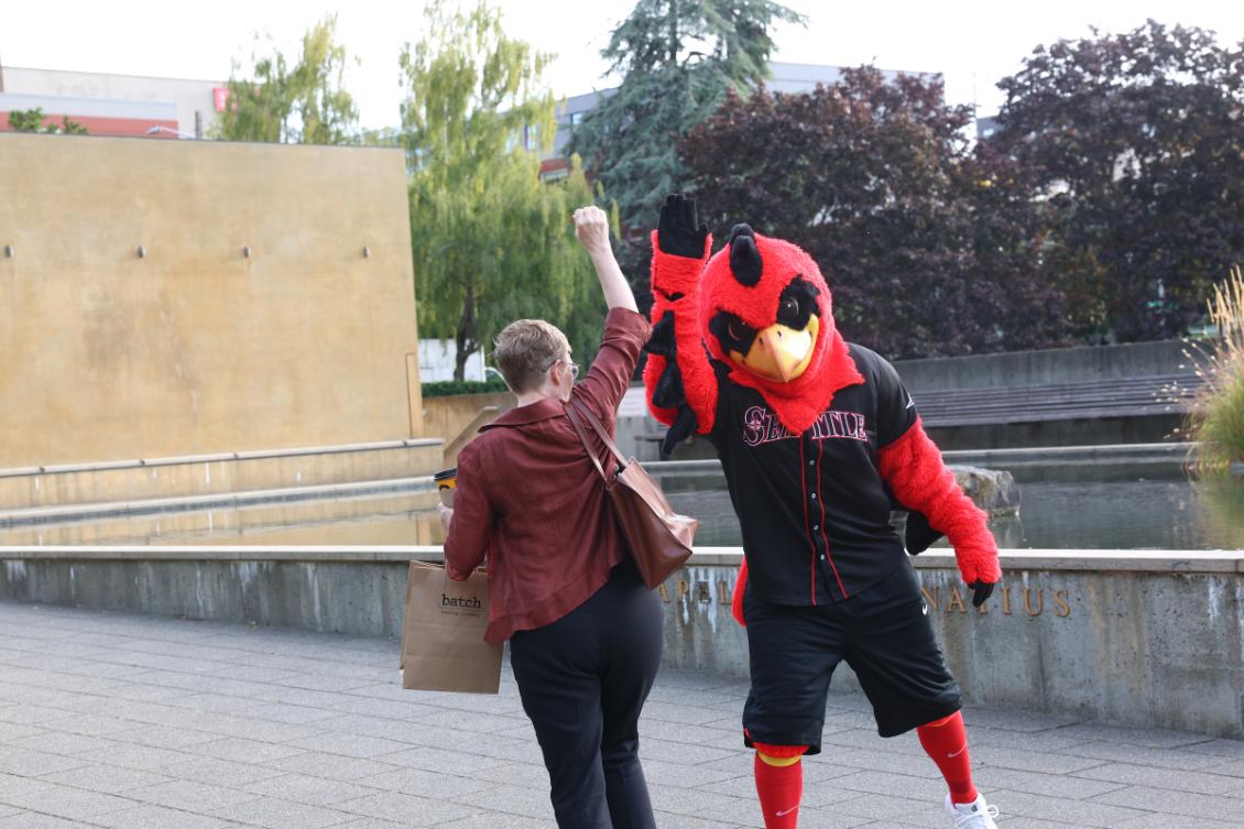 President Mast high five Rudy.jpeg