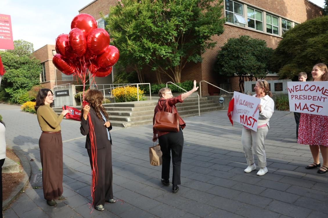 President Mast with supporters walk off photo.jpeg