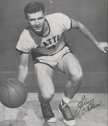 A photo of a young Johnny O'Brien dribbling a basketball