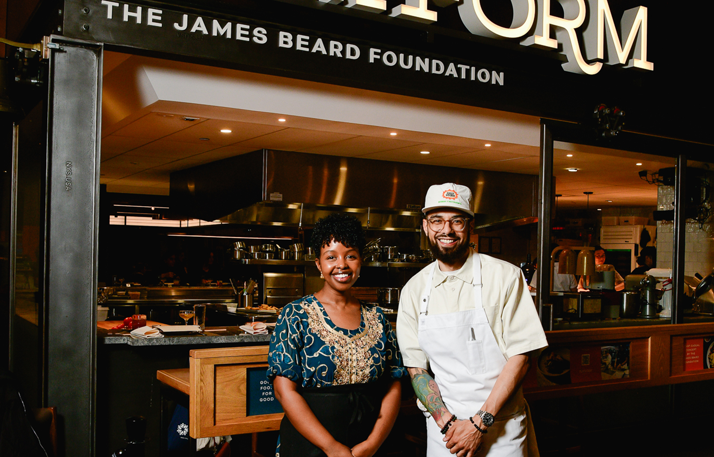 a photo of Ifrah F. Ahmed posing with another chef