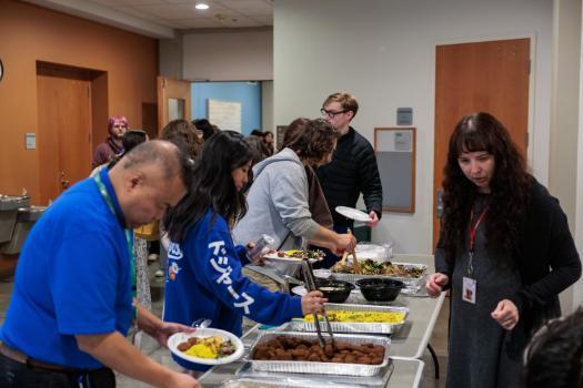 Image of food being served at Arab American Heritage Month event