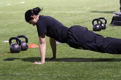 Female Cadet doing pushup