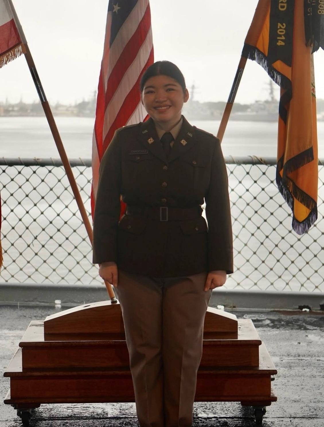 Cadet with flags on ship