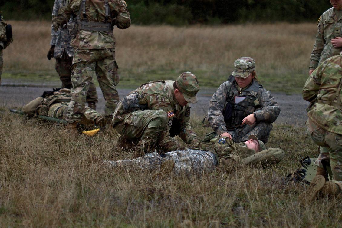 Cadets on field w/ mock injured soldier