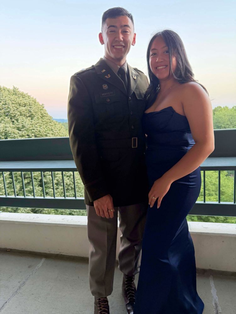 Officer with woman in gown