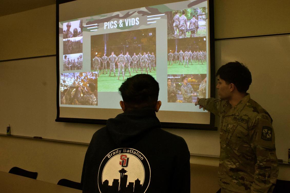 Cadet in uniform w/ 1 new Cadets Brady Battalion sweatshirt