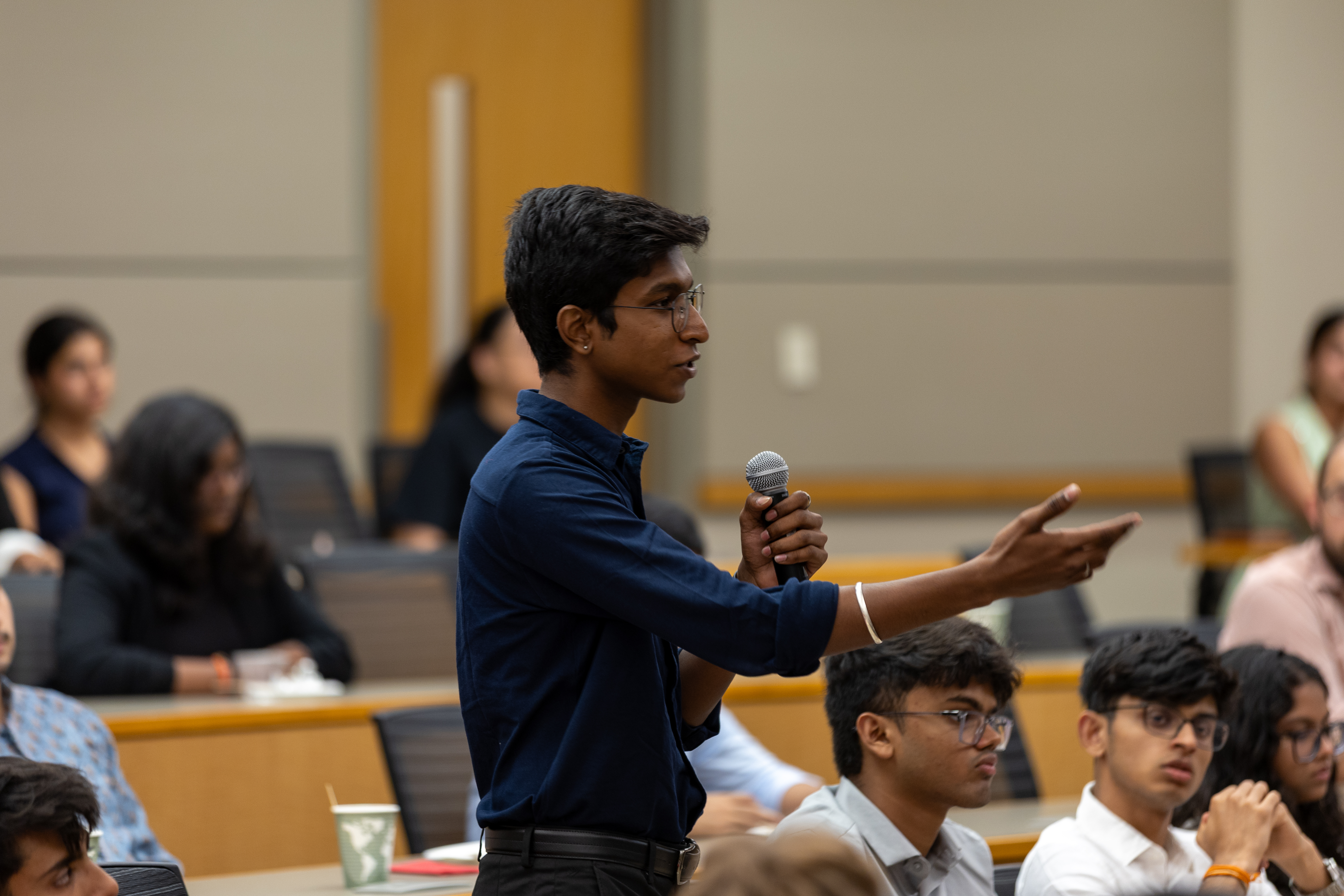 Student asking question in classroom