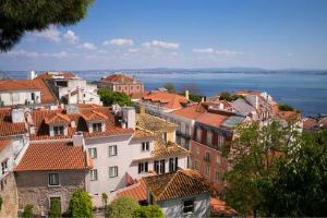 View of rooftops and harbor in Lisbon