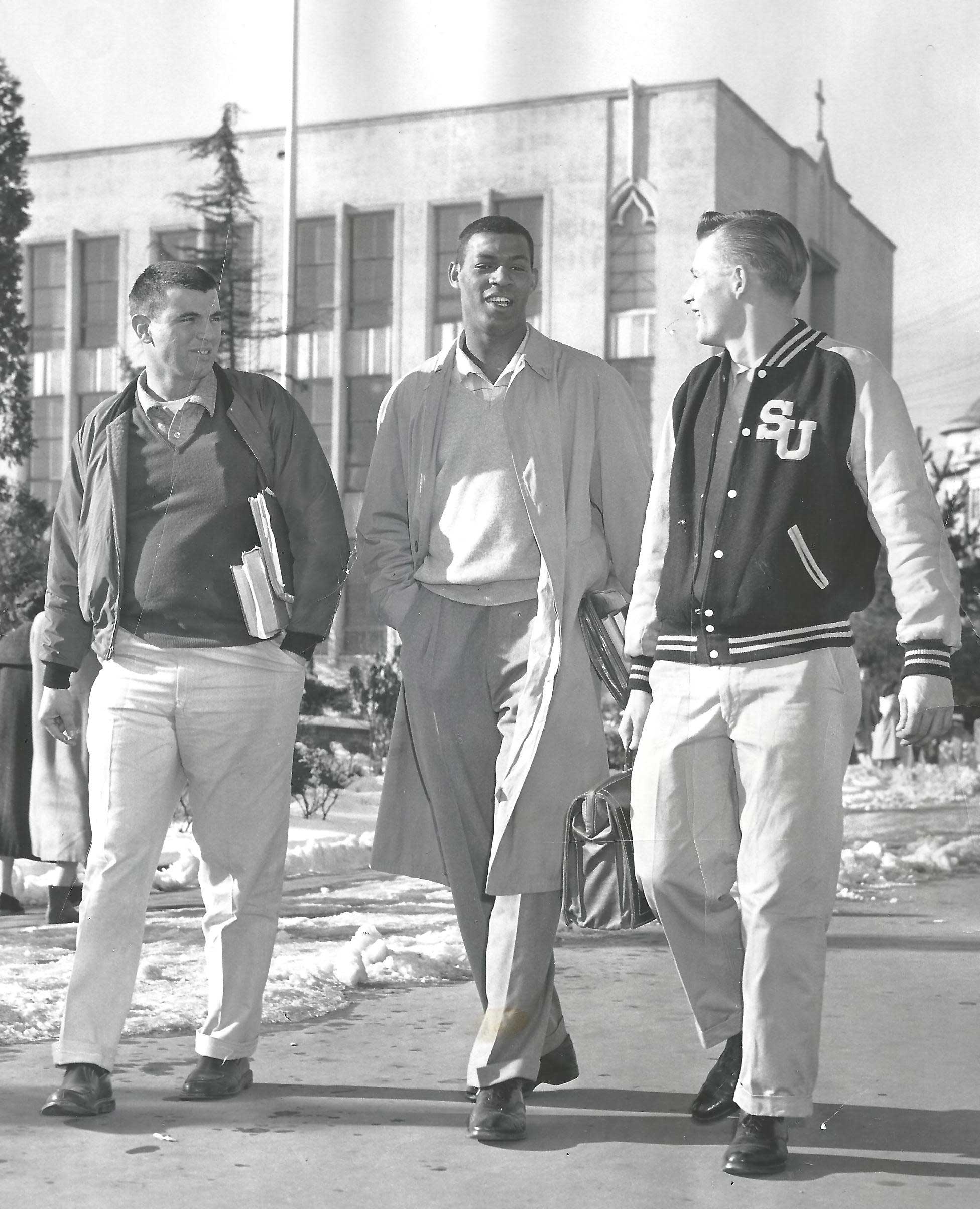 Elgin Baylor on SeattleU Campus Feb 57 with friends in front of current Administration Building