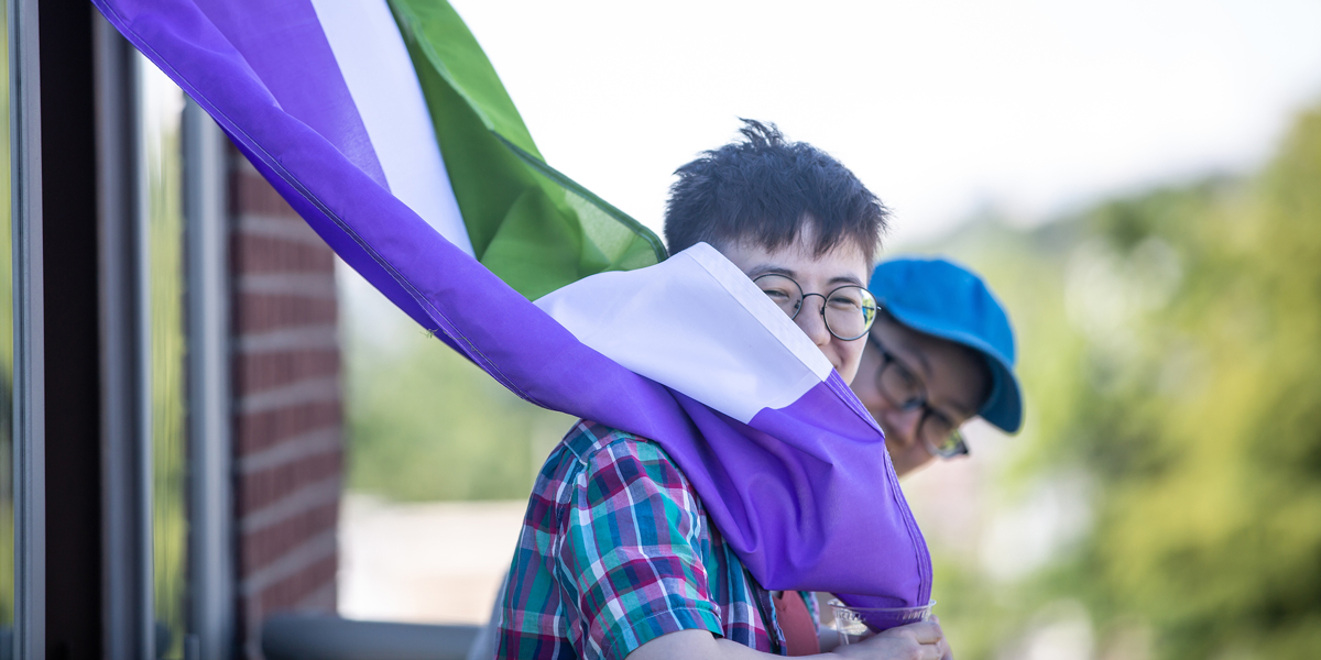 Seattle University students with the gender queer flag