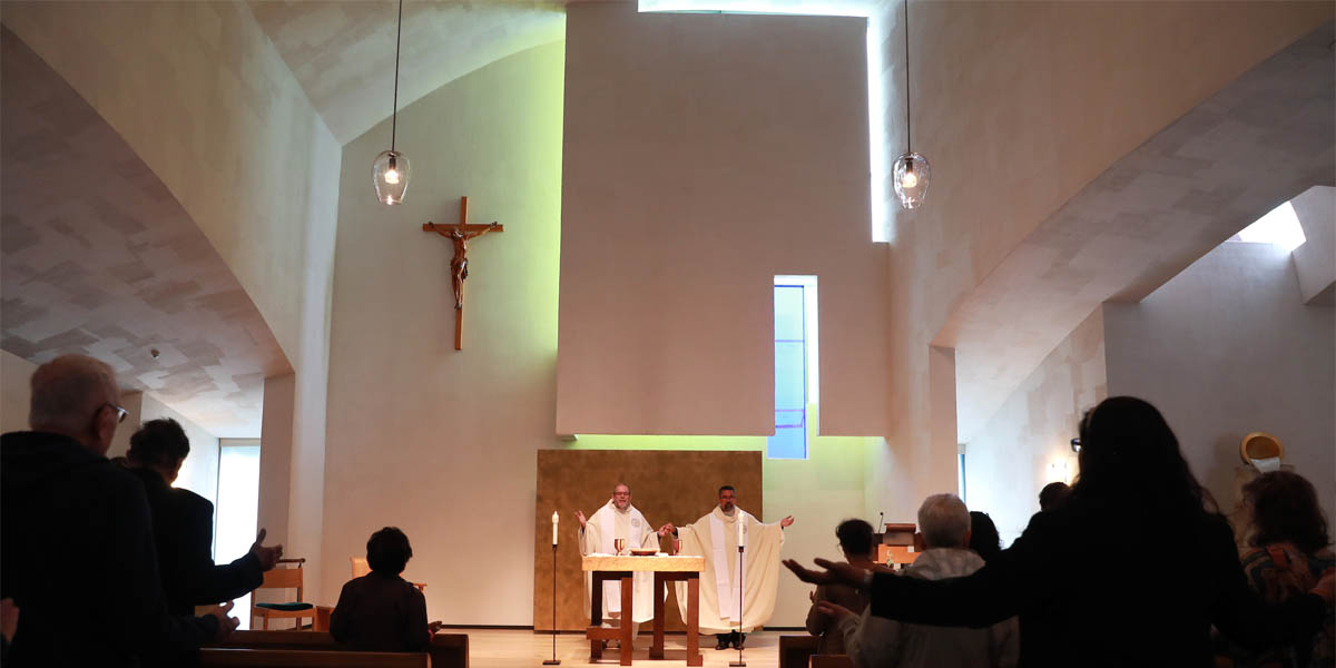 Image of Fr. Arturo Araujo, S.J. being installed as the new rector of the Arrupe Jesuit Community at Seattle University during a mass held at the Chapel of St. Ignatius on campus in 2019.