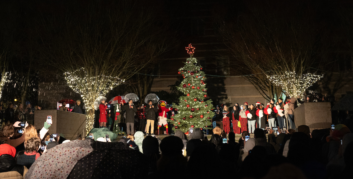 Christmas tree lighting with president and students