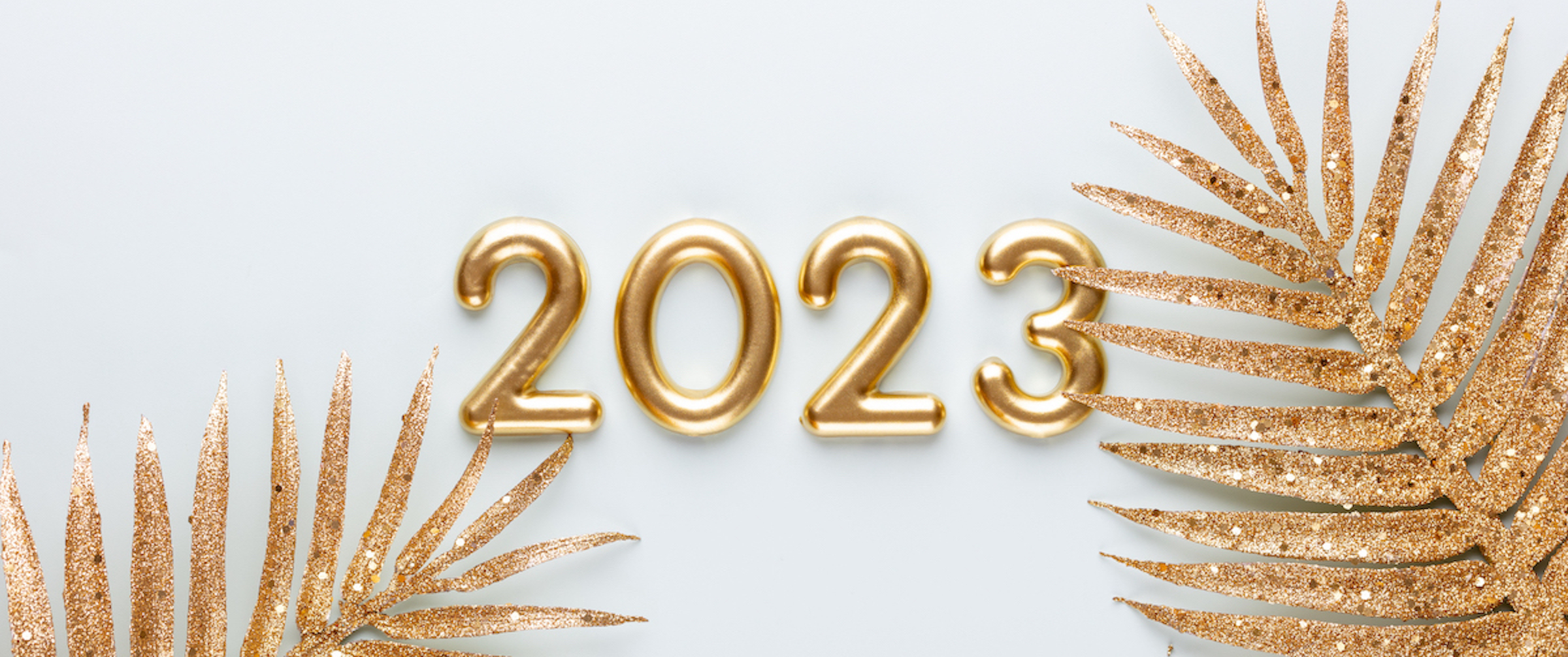 A gold and white graphic celebrating the year.